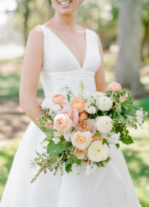 A bride holding a bouquet of flowers