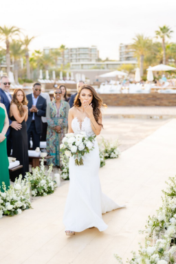A bride walking down the aisle.