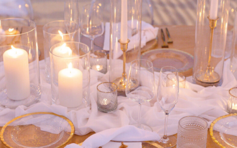 Stunning wedding set-up with candles and glasses