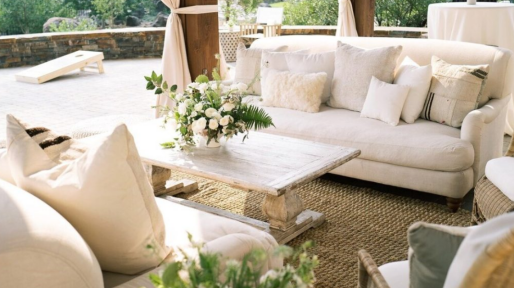 Beige Sofas and flowers at a wedding