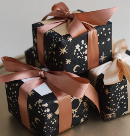 Thoughtfully curated wedding favors wrapped in elegant packaging, ready to delight guests.