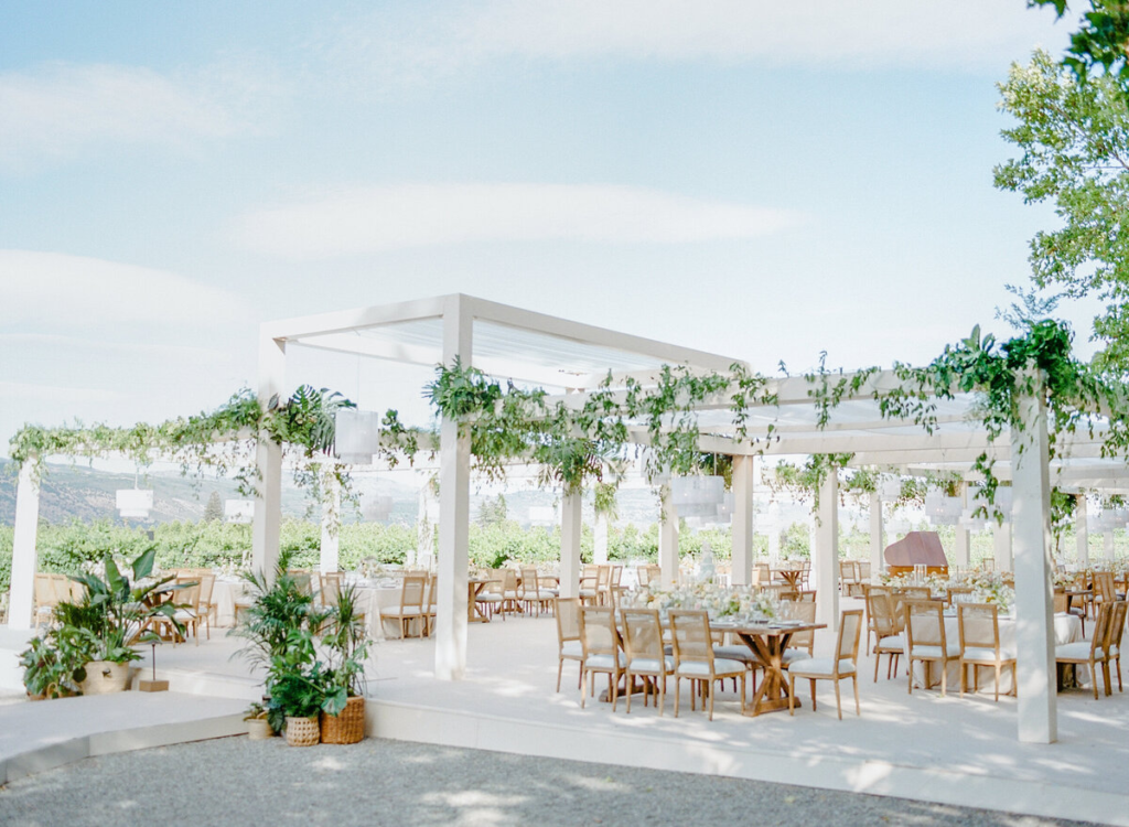 The dining area at a wedding venue, thoughtfully decorated that adds warmth and character to the outdoor event setting.