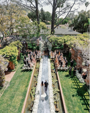 Aerial view of a luxury outdoor garden wedding ceremony planned by Emily Coyne Events.