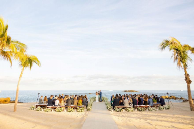 An ongoing wedding ceremony on the beach.