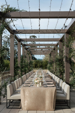 Table set for a rehearsal dinner.