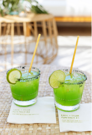 Two glasses of green drinks