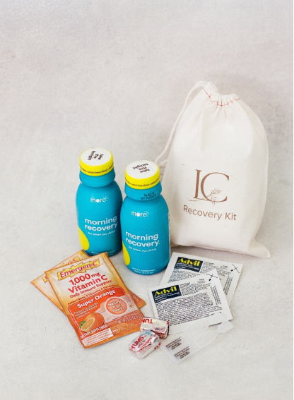 Wedding recovery kit with Morning Recovery drinks, vitamin C, and Advil for guests