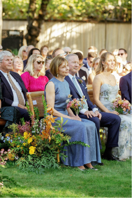 a wedding guest in a blue dress