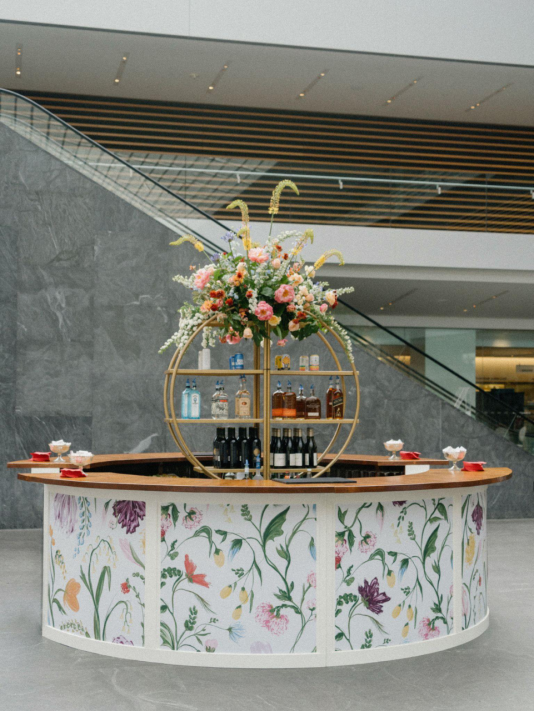 a bar with drinks at a wedding