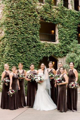bridesmaids standing next to the bride