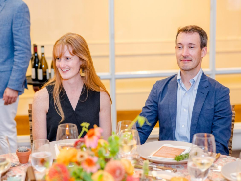 wedding guests smiling at the reception