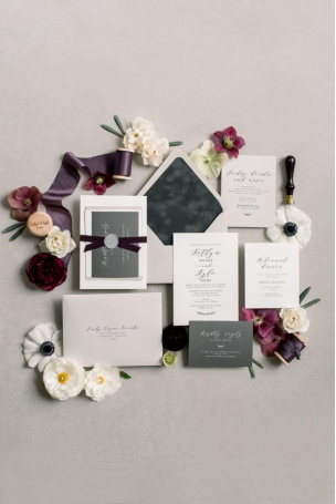 wedding invites adorned with ribbons.