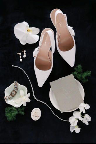 bridal accessories placed on a black surface