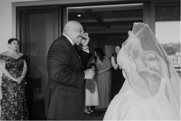 A sentimental moment between a bride and their relative